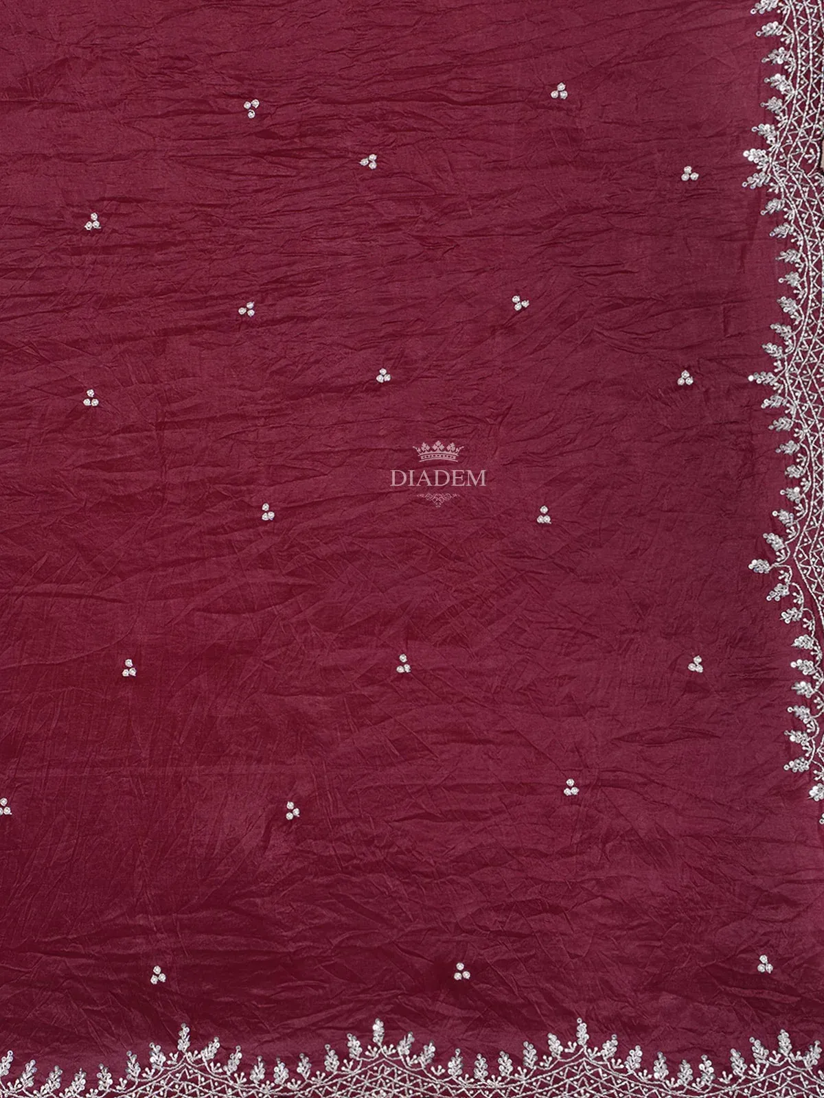 Burgundy Semi Organza Saree with Floral Designs on the body and Embroidery Border