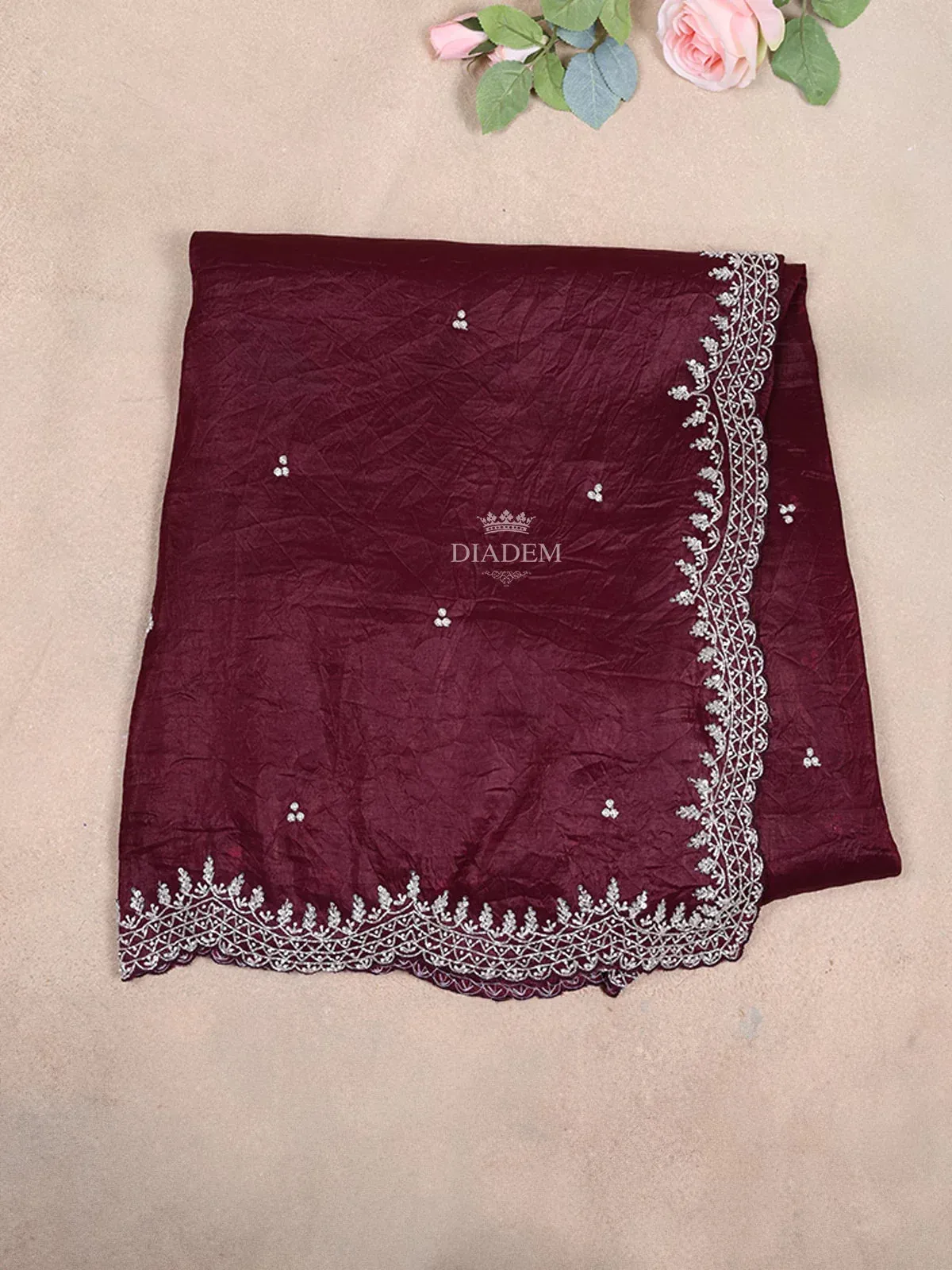 Burgundy Semi Organza Saree with Floral Designs on the body and Embroidery Border